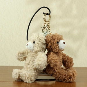 Plush teddy bear keychain pendants in beige and brown with golden metal lobster clasps