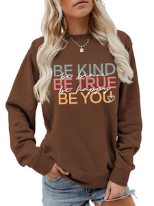 Close-up of brown cotton sweatshirt featuring inspirational print and leopard heart