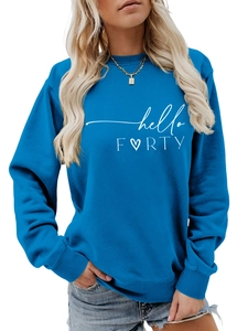 Detailed view of the ribbed crew neck and heart print on a royal blue sweatshirt