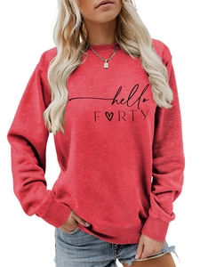 Detail of hello FORTY text print and heart design on brick red long sleeve sweatshirt