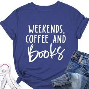 Close-up of weekends coffee and books print on navy blue cotton crewneck T-shirt