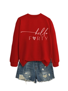 Detail of hello FORTY print on red crewneck sweatshirt with distressed denim shorts