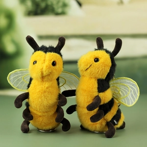 Cute plush bee keychain with yellow and black stripes and delicate mesh wings