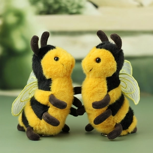 Plush bee keychain set with yellow and black stripes and soft faux fur material