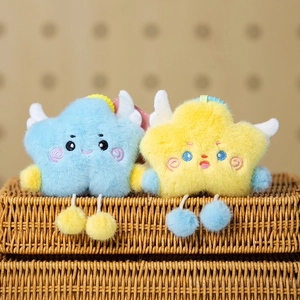 Detailed view of plush star keychains with wings and cute faces in a woven basket