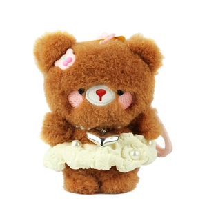 Plush brown bear keychain in lace princess dress with pearl necklace on white background