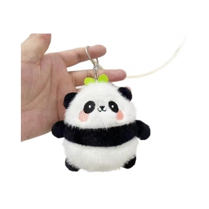 Cute plush panda keychain with green leaves and pink cheeks on white background