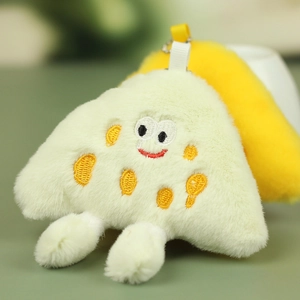 Macro view of cute plush toast charm featuring a smiling face and silver ball chain