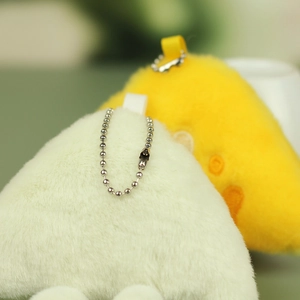 Rear view of soft plush triangle toast pendants with silver metal ball chains