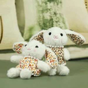 Cute plush bunny dolls in floral dresses as decorative keychains and bag charms