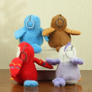 Set of four plush bird keychain charms in red blue brown and purple colors