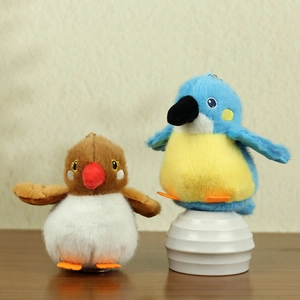 Cute plush penguin and chick keychain charms in blue and brown for bag decoration