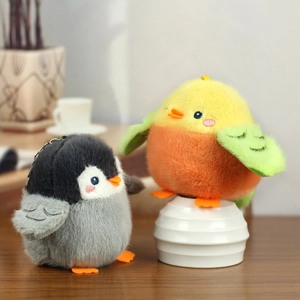 Cute plush penguin and chick keychain charms with soft fur and metal clips