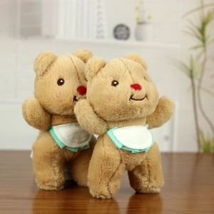 Cute butter bear plush pendant toy with red nose and green-edged bib for backpack