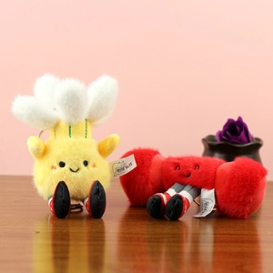 Porte-clés en peluche fleur jaune et personnage rouge avec sourires mignons