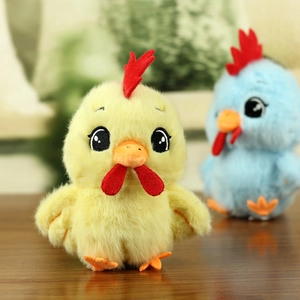 Close-up of cute plush chicken charms in yellow and blue with soft faux fur texture