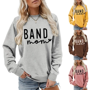 Detail view of BAND MOM long sleeve sweatshirts in grey, yellow, brown, and pink options