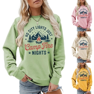 Detail of crewneck sweatshirt featuring outdoor mountain print and ribbed cuffs