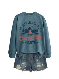 Detail of the high-quality mountain graphic print on a grey-blue outdoor crewneck sweatshirt