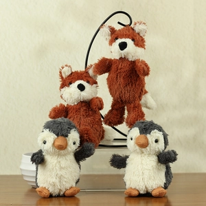 Detailed plush toy set featuring soft peanut penguin and orange fox stuffed animals