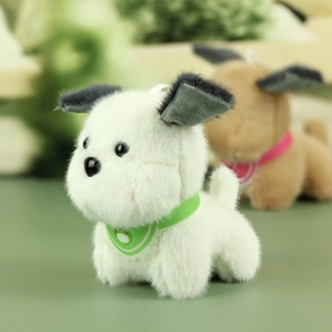 Close-up of soft plush puppy keychain with fluffy texture and cute lace bib detail