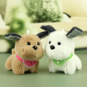 Detail of plush puppy keychains with lace bibs in brown and white fluffy textures