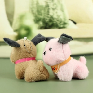 Pair of cute plush puppies in brown and pink with colorful collars and metal bead chains