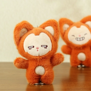 Cute orange plush fox keychain with fluffy fur and detailed embroidery for bags