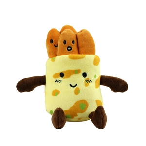 Plush pancake wrap toy with cute smiling faces and orange sausage fillings on white background