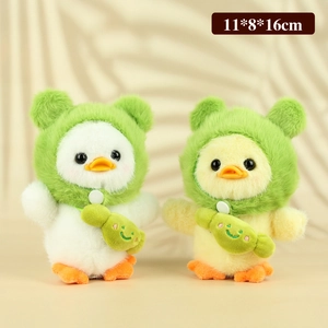 Plush duck keychains in white and yellow wearing green frog hats and small fish bags
