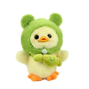 Cute yellow duck plush toy wearing a green frog hoodie and matching crossbody bag