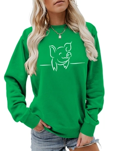 Detail of cute minimalist pig print on casual bright green long sleeve sweatshirt