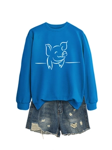Flat lay of royal blue crewneck sweatshirt with cute pig print and distressed denim shorts