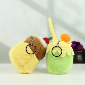 Close-up of cute plush drink cup keychains featuring colorful boba and fruit designs