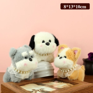 Trois porte-clés chiots Schnauzer en peluche gris, blanc et brun avec colliers en dentelle