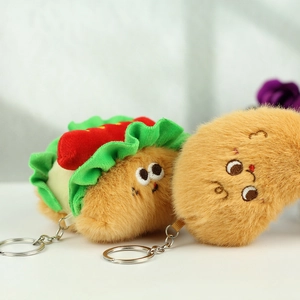 Close-up of plush hot dog and creative cartoon animal keychains with metal rings