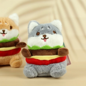 Detail of plush cat burger pendant featuring creative layers of lettuce and cheese