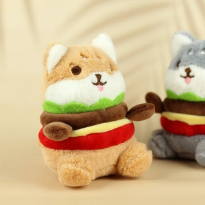 Macro detail of plush burger animal keychain showing soft faux fur and embroidery