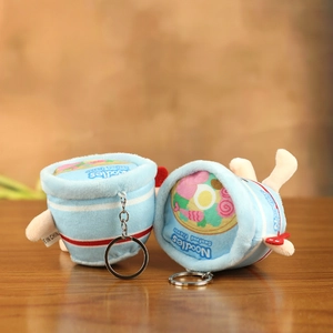Detailed view of light blue cup noodle plush keychain with seafood flavor patterns