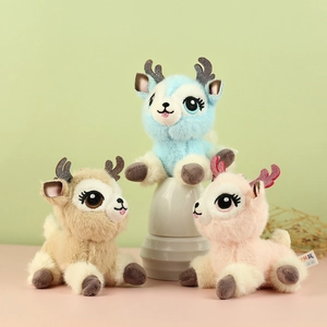 Three cute plush deer keychain pendants in blue, brown, and pink with big eyes