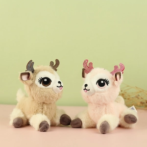Close-up of cute plush deer toys in brown and pink with soft textures and fuzzy collars