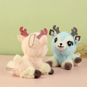 Close-up of plush sika deer pendant with glittery antlers and soft texture details