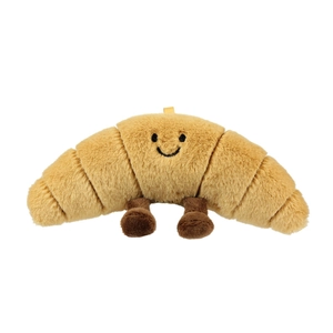 Cute plush croissant keychain with smiling face and small legs on white background