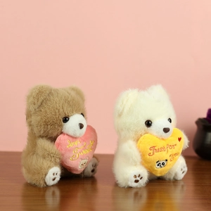 Cute teddy bear plush charms with embroidered hearts in dark brown and creamy white