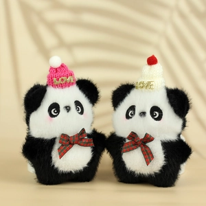 Close-up of cute plush panda keychains with knitted LOVE hats and plaid bow ties