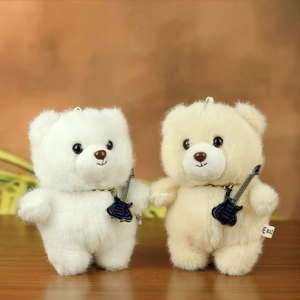 Cute teddy bear plush keychains in white and beige with miniature blue guitars