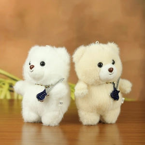 Plush teddy bear keychain pendants in white and cream with mini guitars and bead chains
