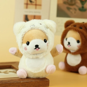 Detail of plush shiba inu keychains in cute animal costumes on a warm wooden background