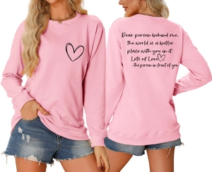 Vue avant et arrière du sweat-shirt rose avec impression de cœur et citation au dos