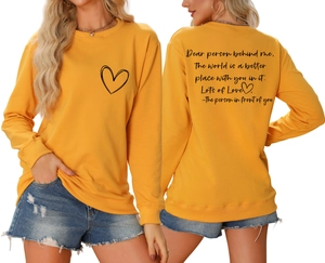 Vue détaillée avant et arrière du sweat-shirt jaune avec cœur et slogan positif